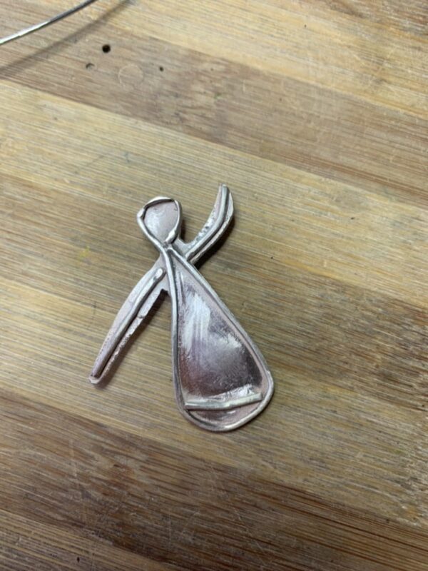 dancer twirling pendant